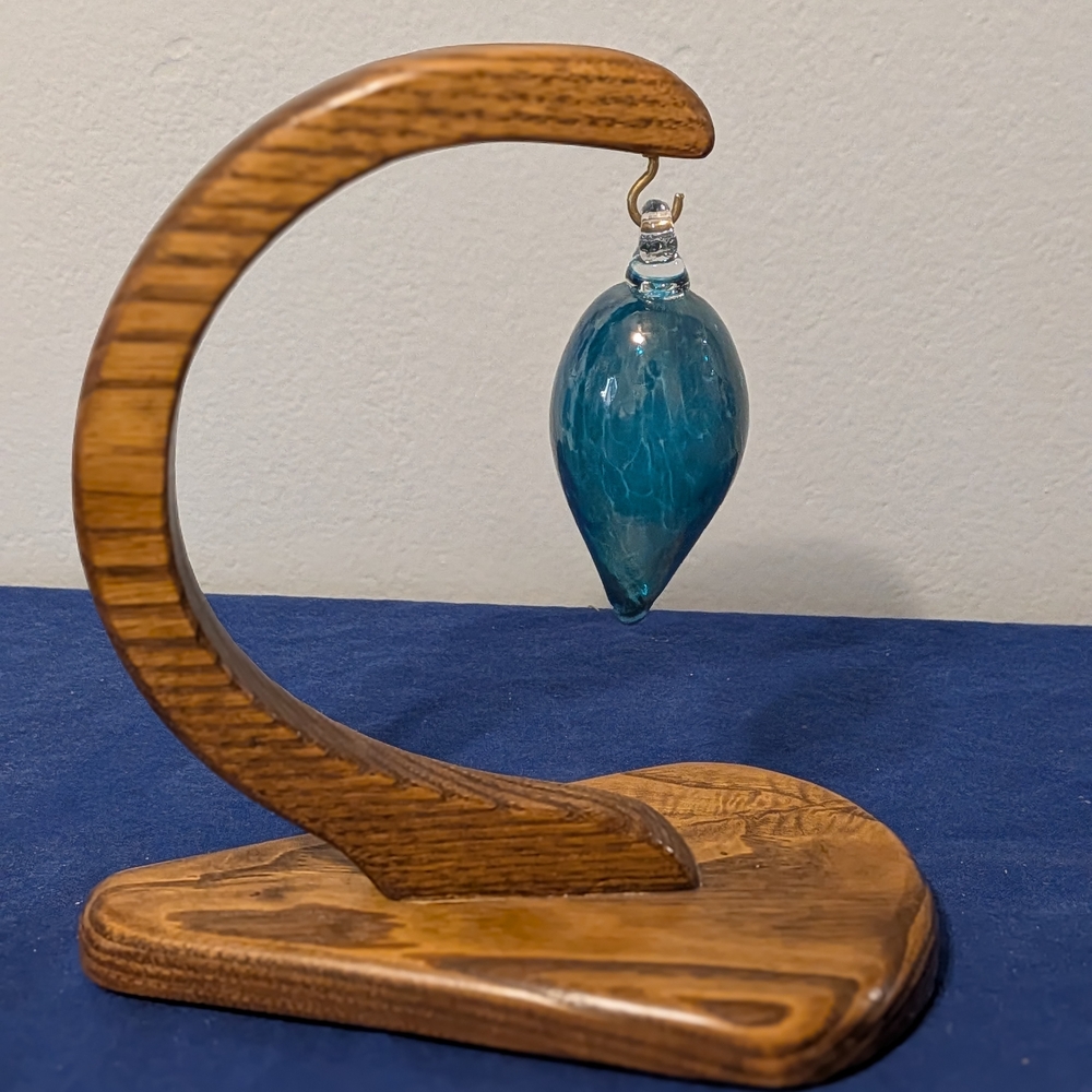 Elegant Blue Glass Ornament with Wooden Stand